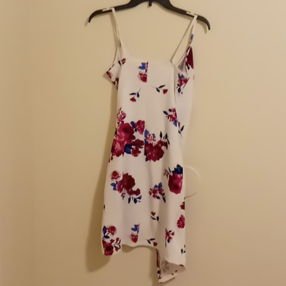 NWOT Floral Asymmetrical faux wrap dress. - Picture 2 of 2